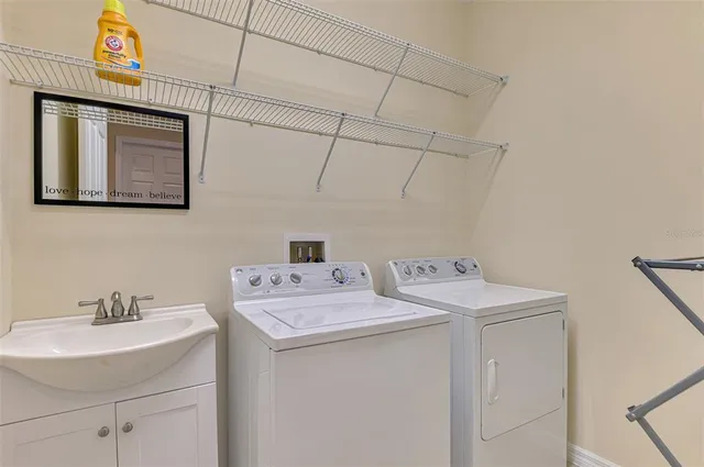 a view of a lake with houses in the back