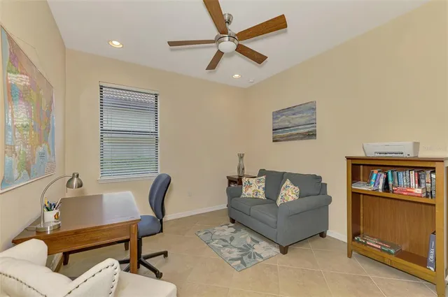 an aerial view of residential houses with outdoor space and street view