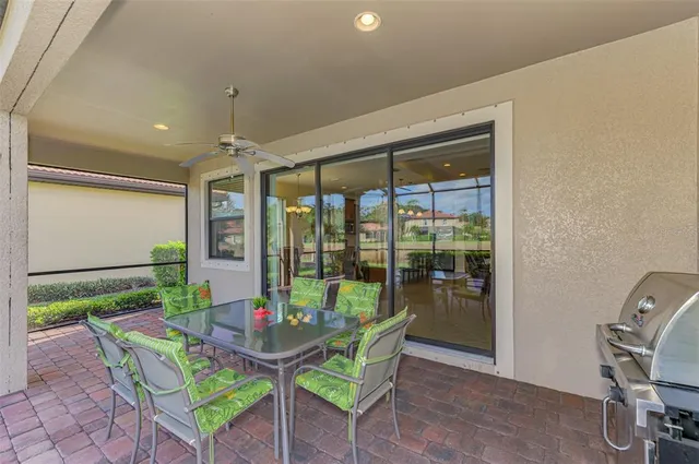 an aerial view of a house with a lake view