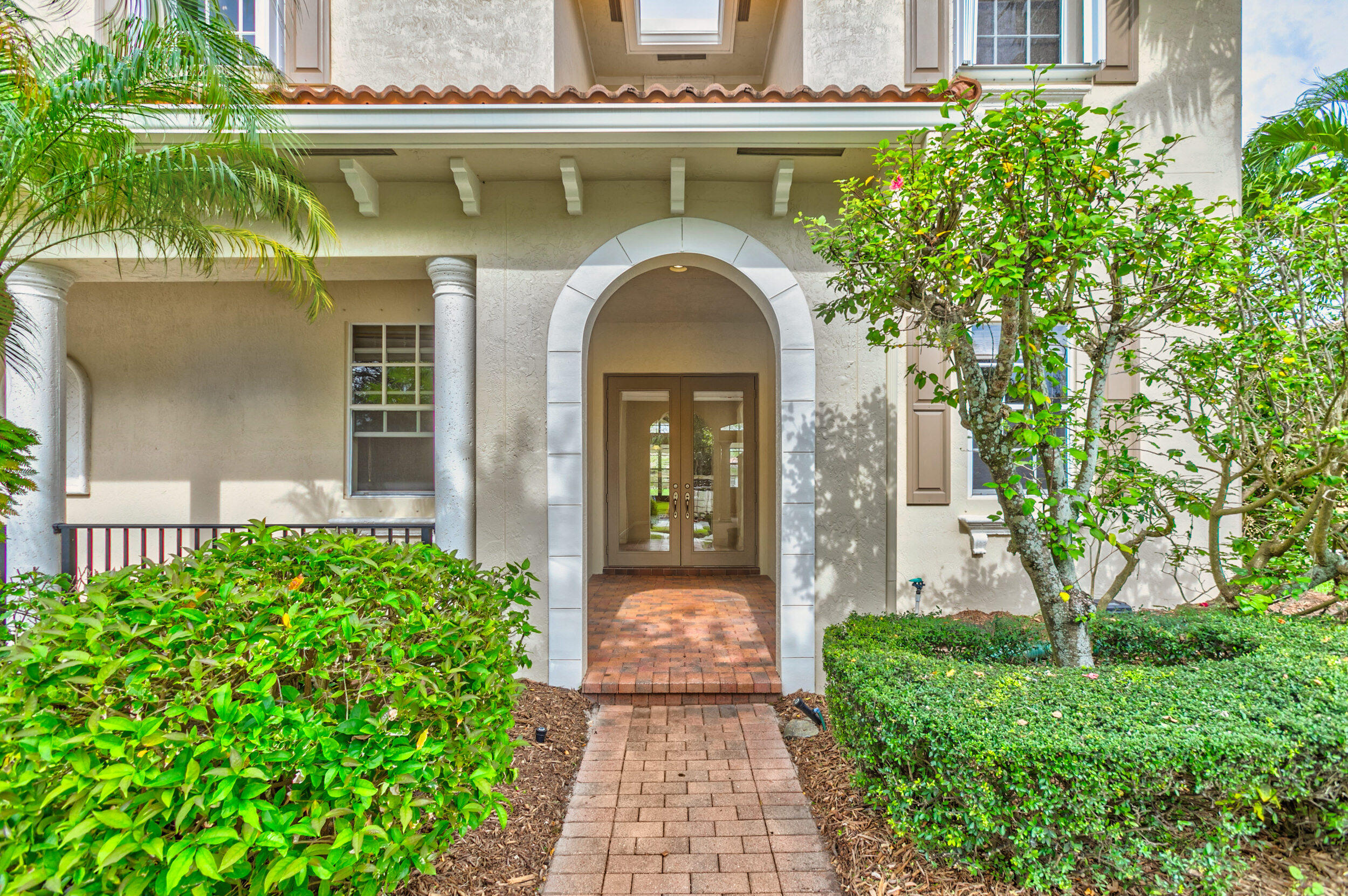 176 Via Veracruz Jupiter, FL 33458 - Photo 4 of 81 walkway to double french door