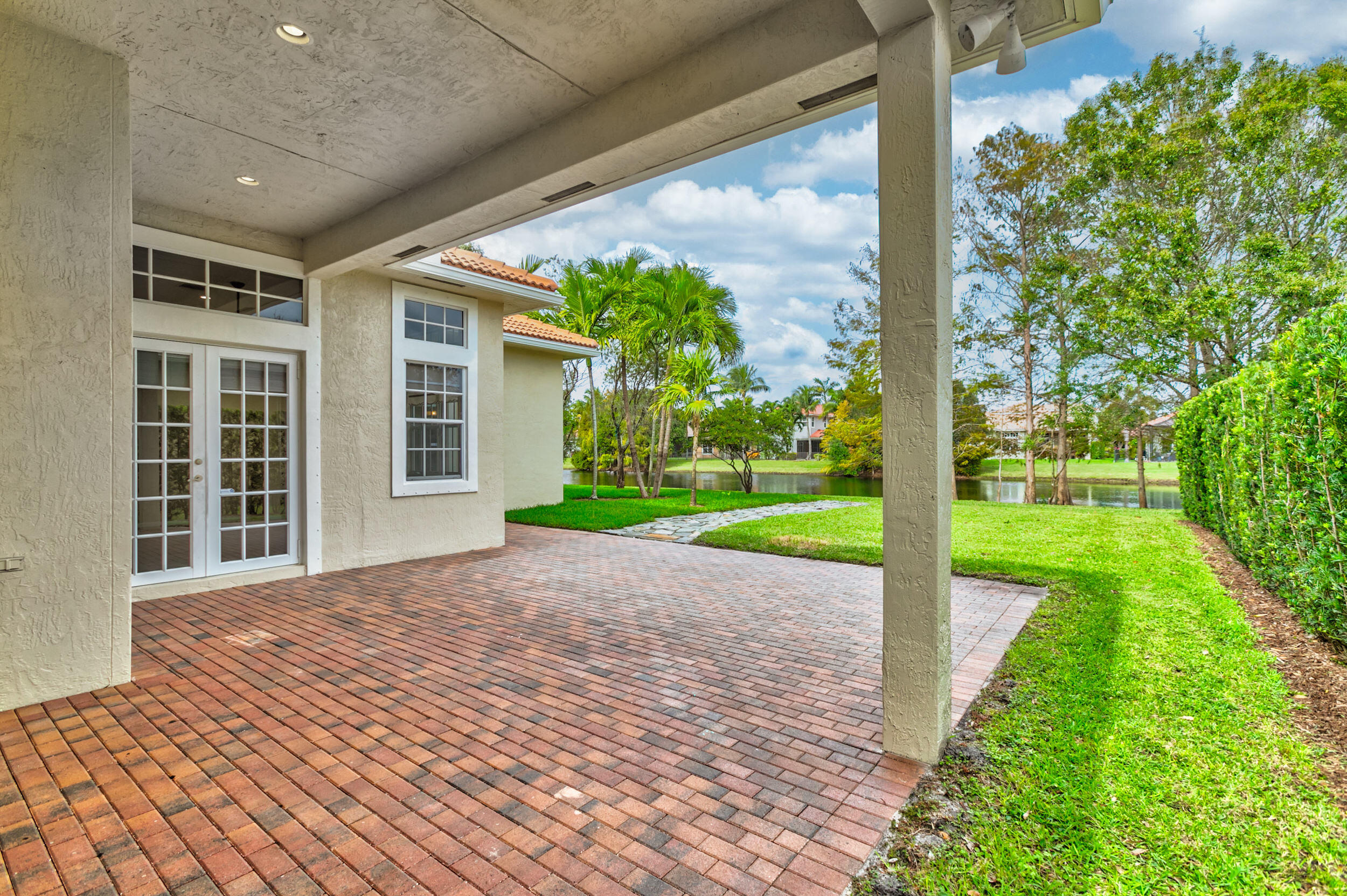 176 Via Veracruz Jupiter, FL 33458 - Photo 59 of 81 rear view of east side