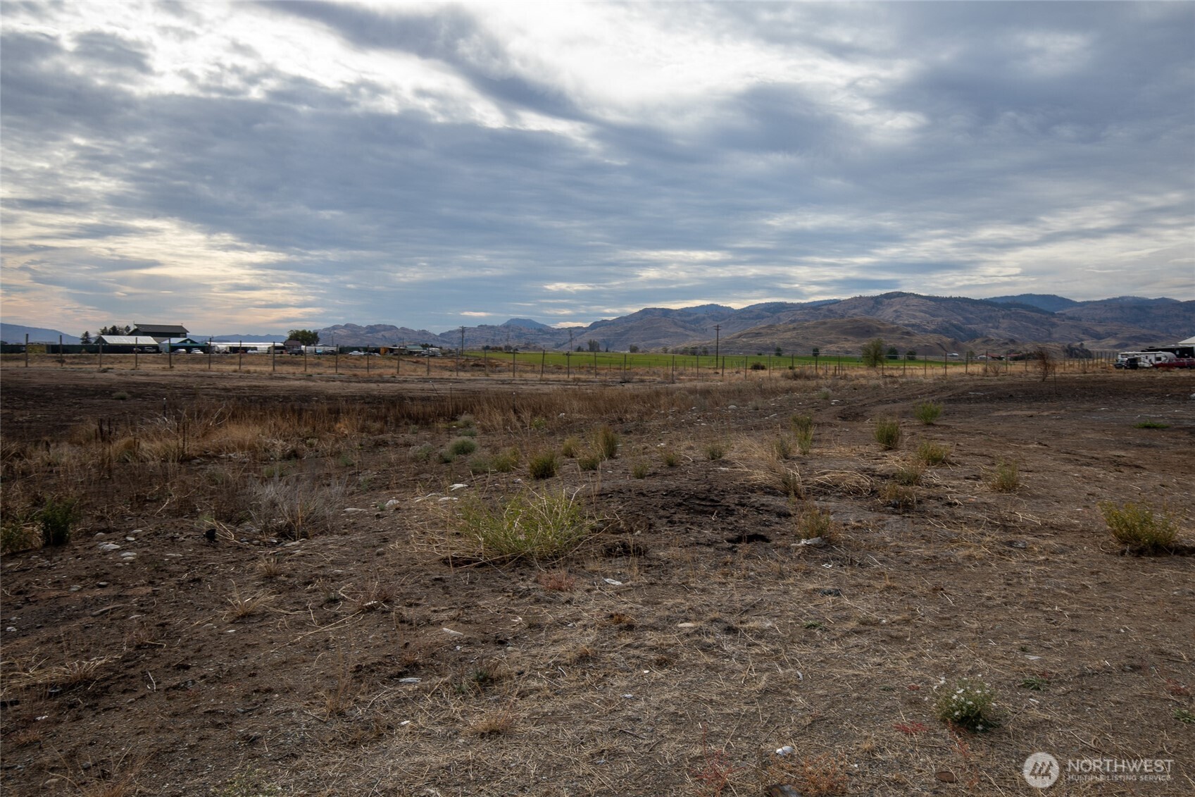 105 Greenacres Road Riverside, WA 98849 - Photo 5 of 8 a view of an outdoor space with mountain view