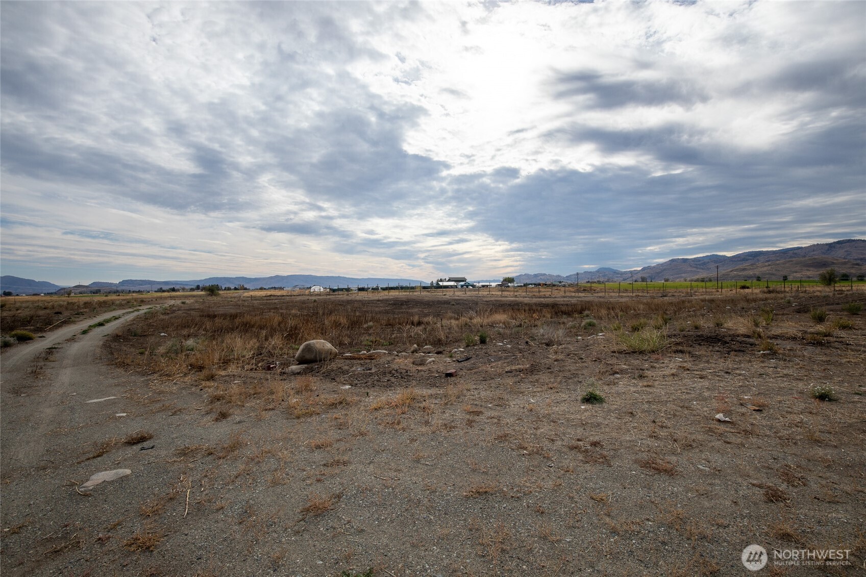 105 Greenacres Road Riverside, WA 98849 - Photo 8 of 8 a view of a large body of water with lots of trees in all around