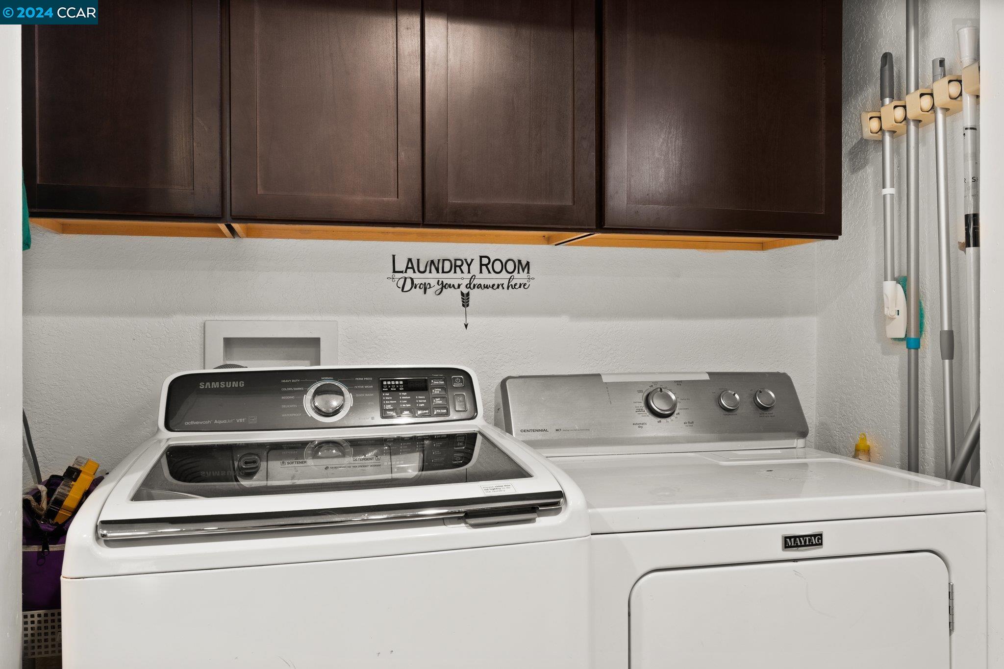 55 Pacifica Avenue, Unit 51 Bay Point, CA 94565 - Photo 13 of 35 a utility room with washer and dryer