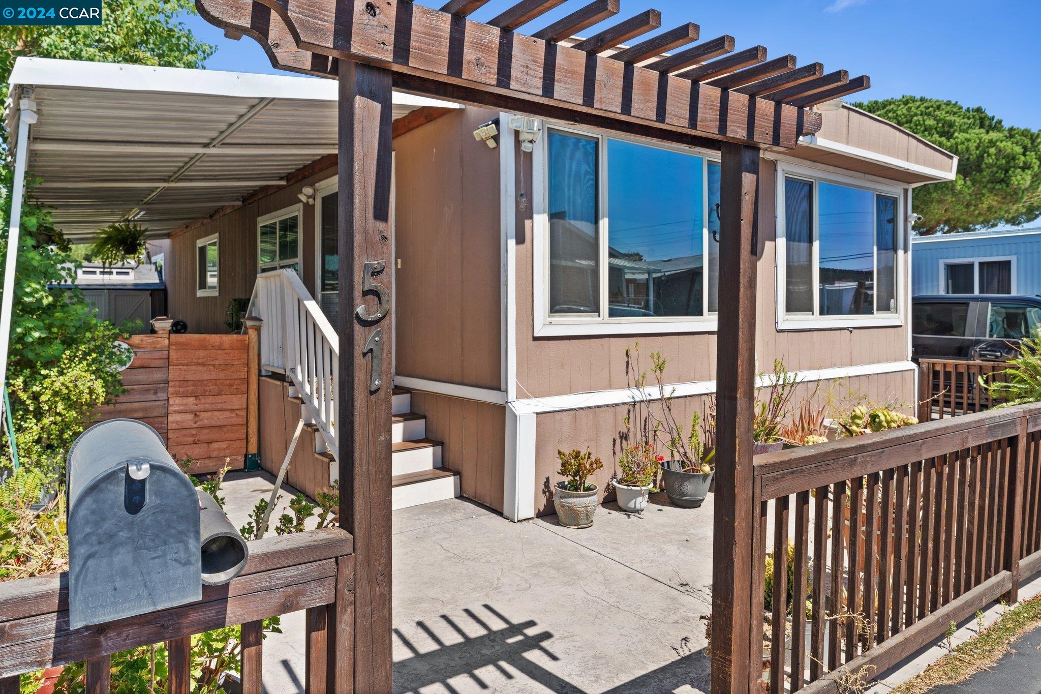 55 Pacifica Avenue, Unit 51 Bay Point, CA 94565 - Photo 35 of 35 a view of a house with a porch