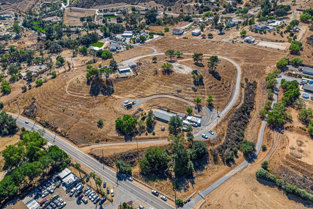 2030 Harbison Canyon Road El Cajon, CA 92019 - Photo 2 of 66 an aerial view of residential houses with outdoor space