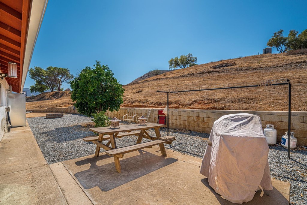 2030 Harbison Canyon Road El Cajon, CA 92019 - Photo 53 of 66 a roof deck with table and chairs