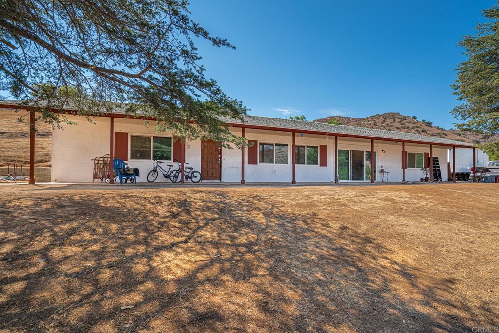 2030 Harbison Canyon Road El Cajon, CA 92019 - Photo 63 of 66 a front view of house with yard outdoor seating and barbeque oven