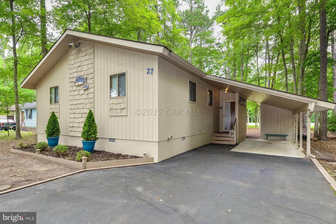27 Brookside Road Ocean Pines, MD 21811 - Photo 1 of 44 a view of a house with a garage