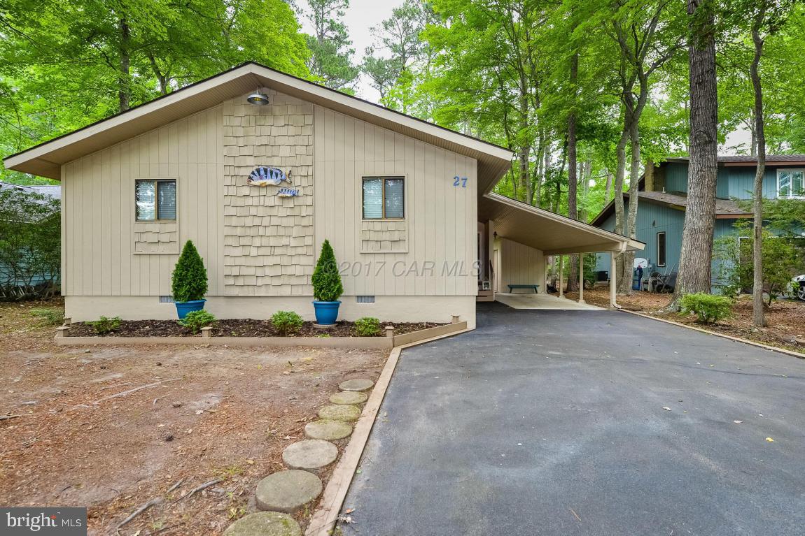 27 Brookside Road Ocean Pines, MD 21811 - Photo 2 of 44 a view of a house with a yard and garage