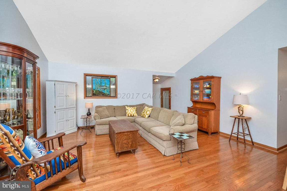 27 Brookside Road Ocean Pines, MD 21811 - Photo 11 of 44 a living room with furniture and a table
