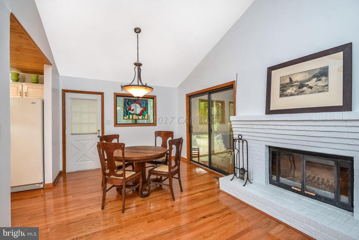 27 Brookside Road Ocean Pines, MD 21811 - Photo 14 of 44 a dining room with furniture window and wooden floor