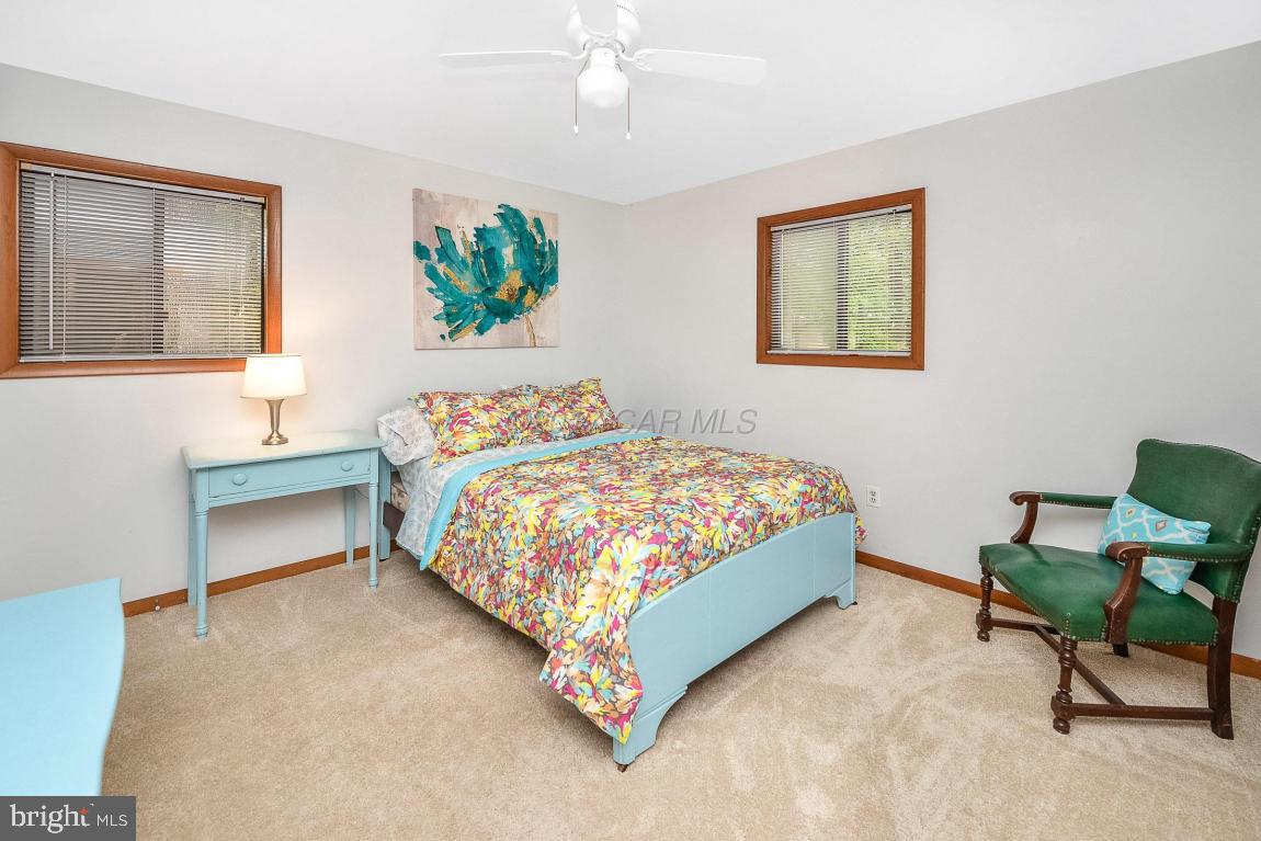 27 Brookside Road Ocean Pines, MD 21811 - Photo 31 of 44 a bedroom with a bed and a window