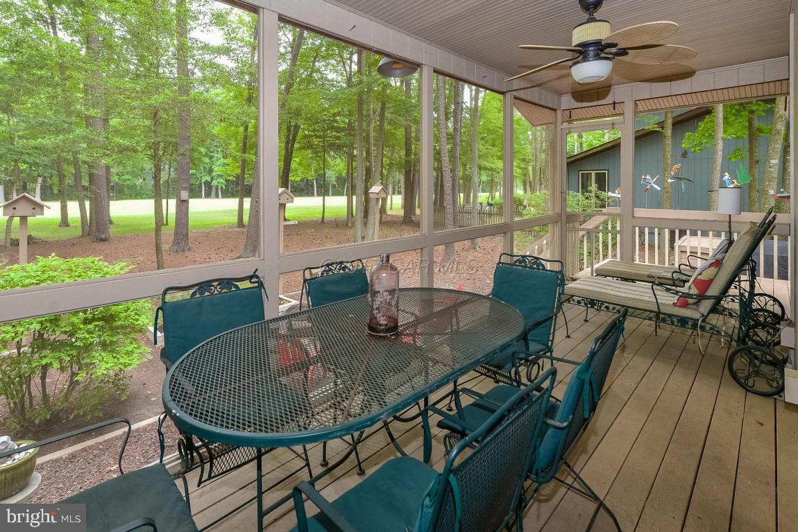 27 Brookside Road Ocean Pines, MD 21811 - Photo 35 of 44 a view of a dining room with furniture window and outside view