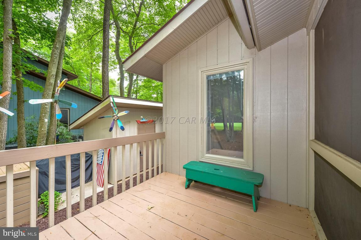 27 Brookside Road Ocean Pines, MD 21811 - Photo 38 of 44 a view of a wooden bench in balcony