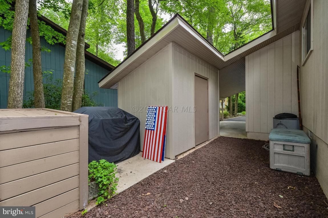 27 Brookside Road Ocean Pines, MD 21811 - Photo 42 of 44 a backyard of a house with seating space