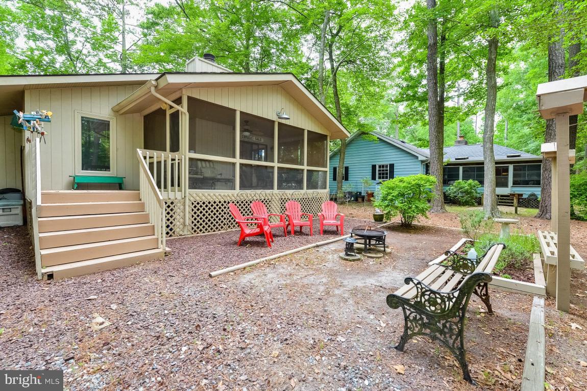 27 Brookside Road Ocean Pines, MD 21811 - Photo 43 of 44 a view of a house with backyard and sitting area