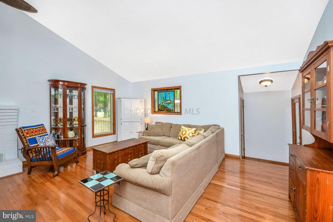 27 Brookside Road Ocean Pines, MD 21811 - Photo 8 of 44 a living room with furniture and a large window