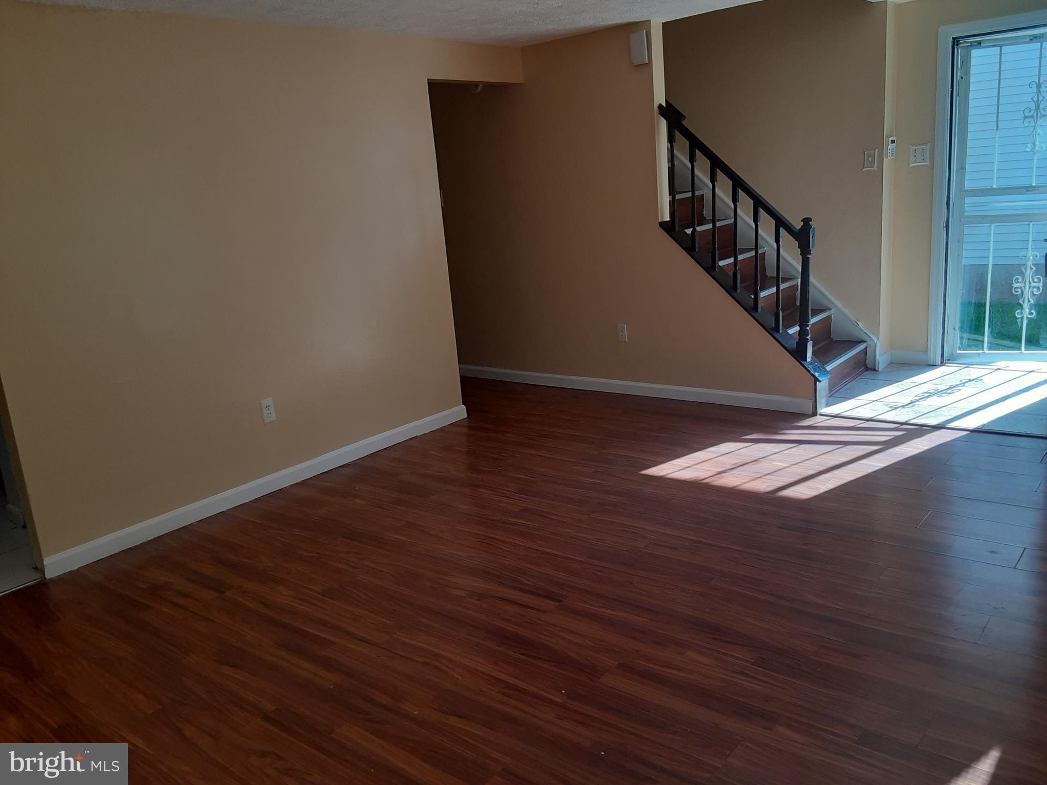 4803 Hawksbury Road Baltimore, MD 21208 - Photo 15 of 19 Main level Living Room view towards front door