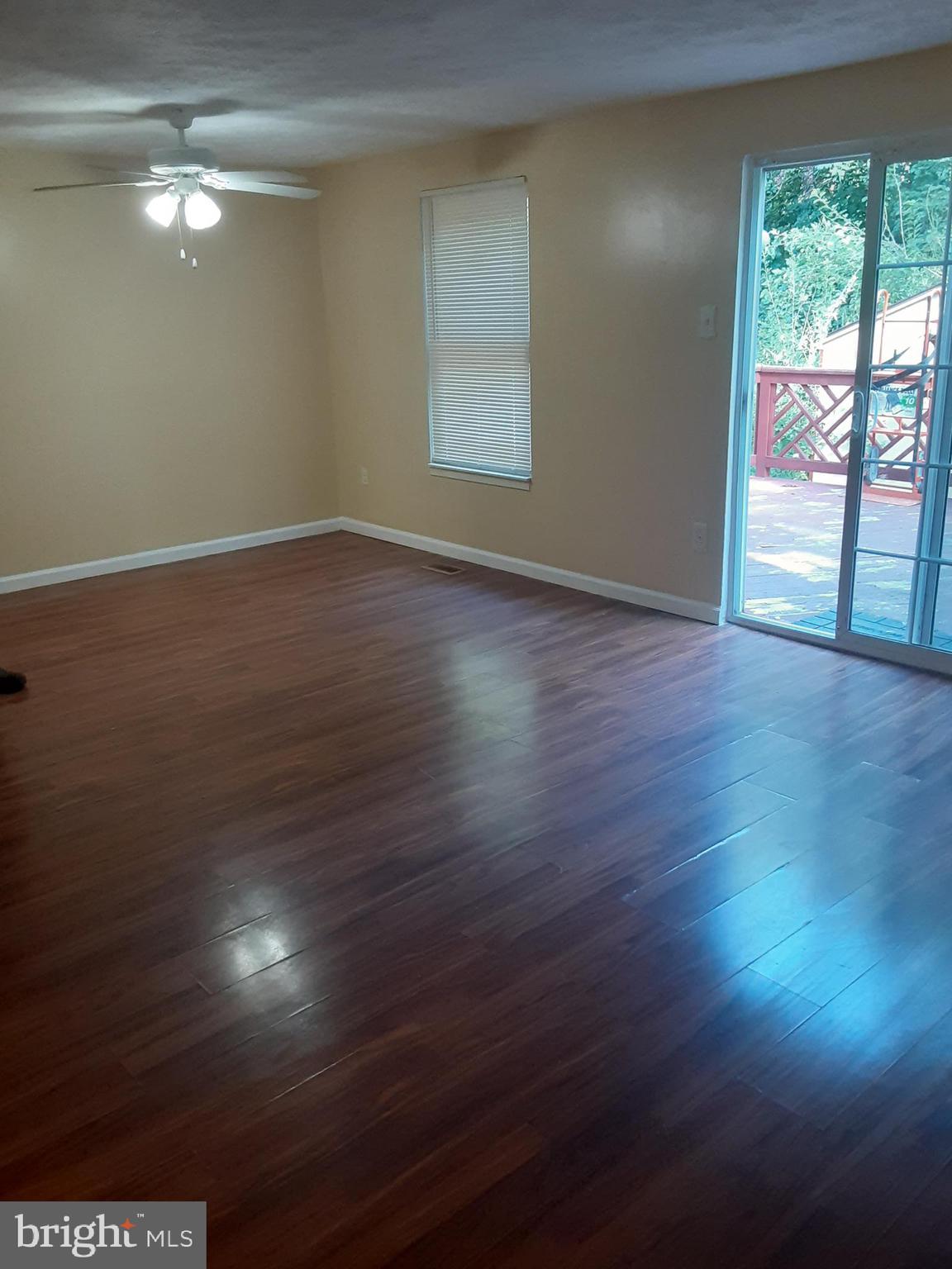 4803 Hawksbury Road Baltimore, MD 21208 - Photo 16 of 19 MAIN LEVEL DINING ROOM GOING TOWARDS SLIDING GLASS