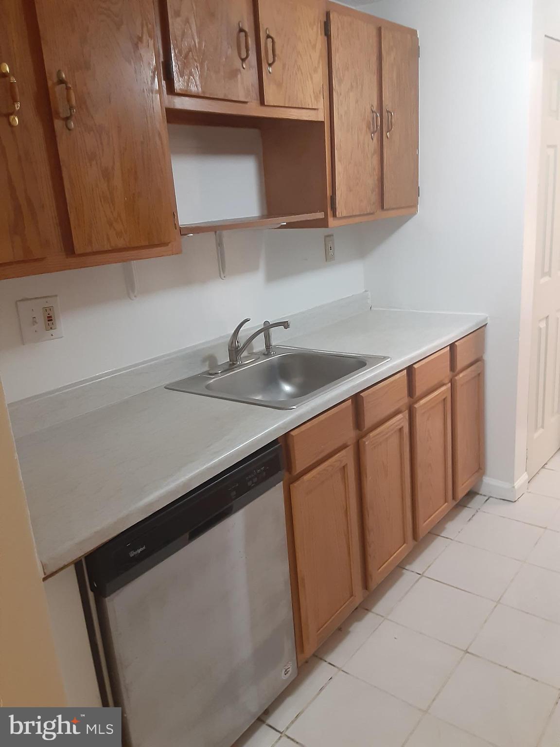 4803 Hawksbury Road Baltimore, MD 21208 - Photo 18 of 19 MAIN LEVEL KITCHEN FROM OTHER SIDE