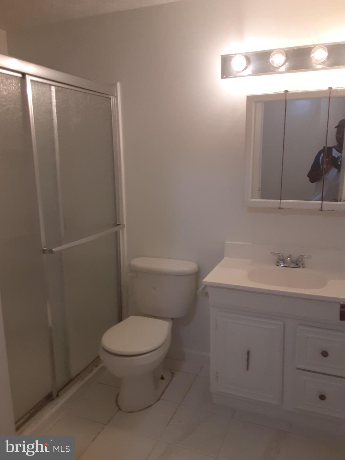 4803 Hawksbury Road Baltimore, MD 21208 - Photo 6 of 19 Upstairs full bathroom