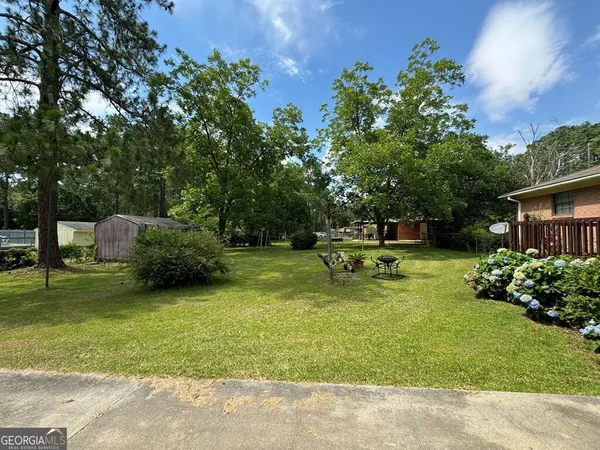 a garden view with a seating space