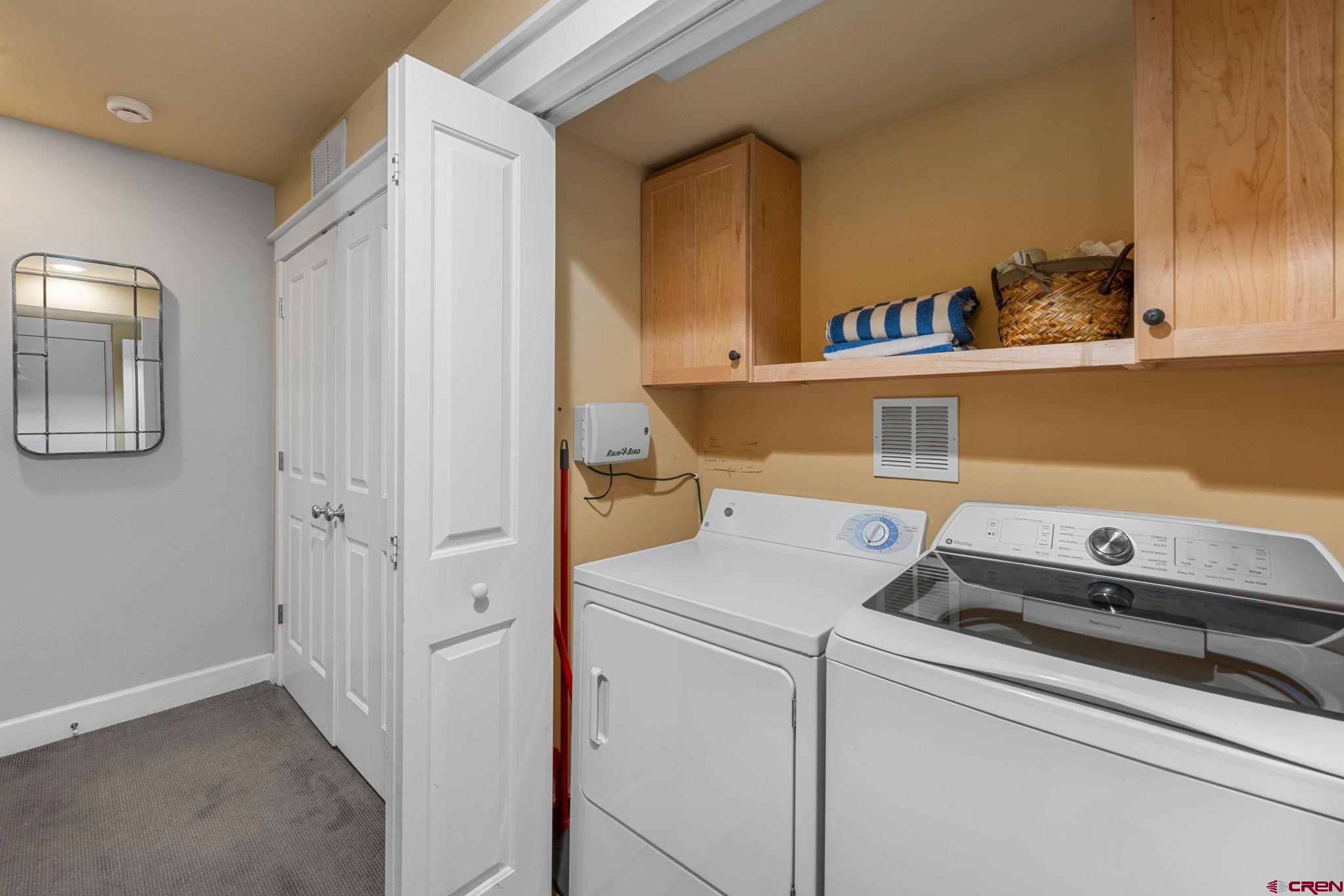 205 Horseshoe Crested Butte, CO 81225 - Photo 27 of 28 a utility room with dryer and washer