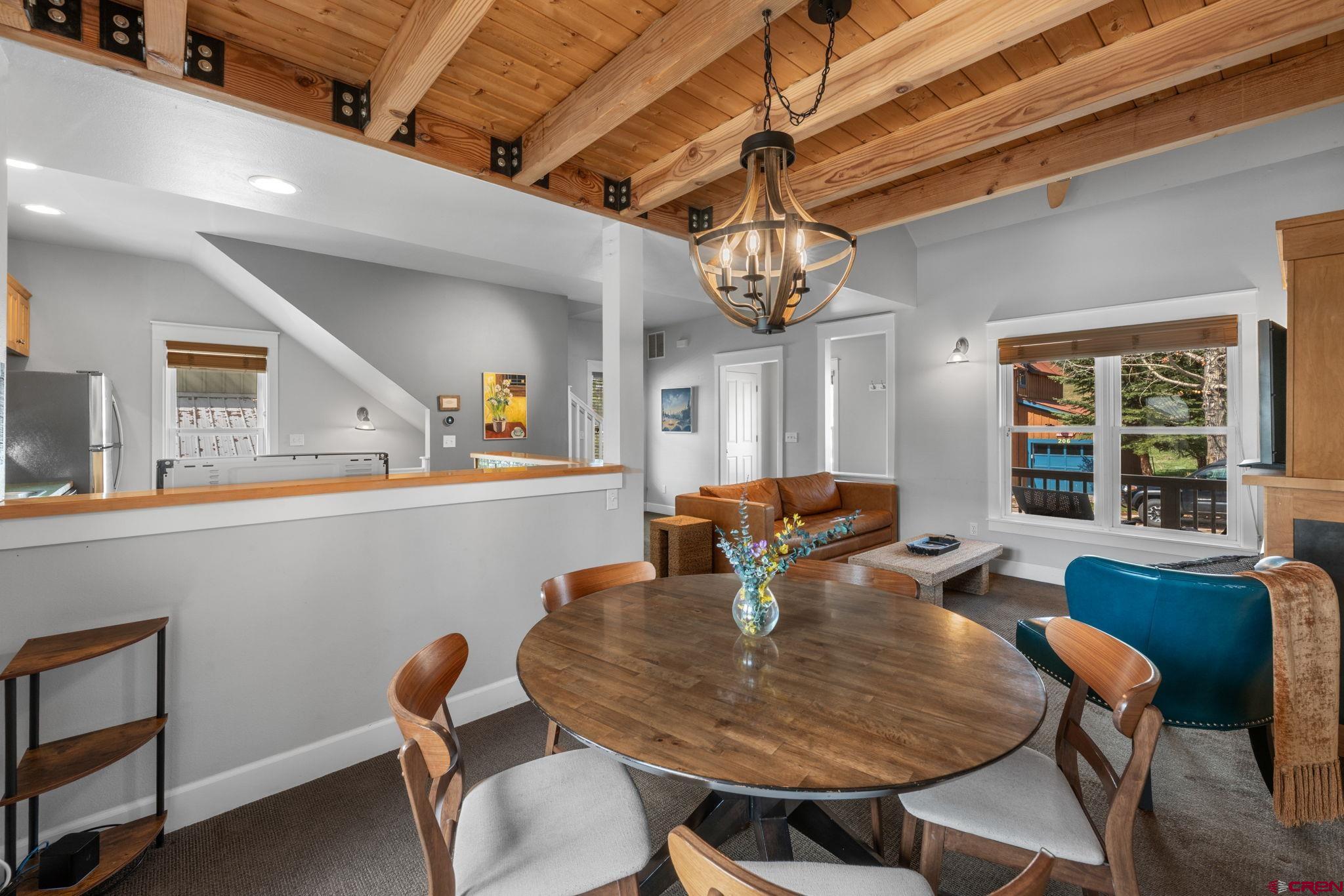 205 Horseshoe Crested Butte, CO 81225 - Photo 10 of 28 a view of a dining room with furniture