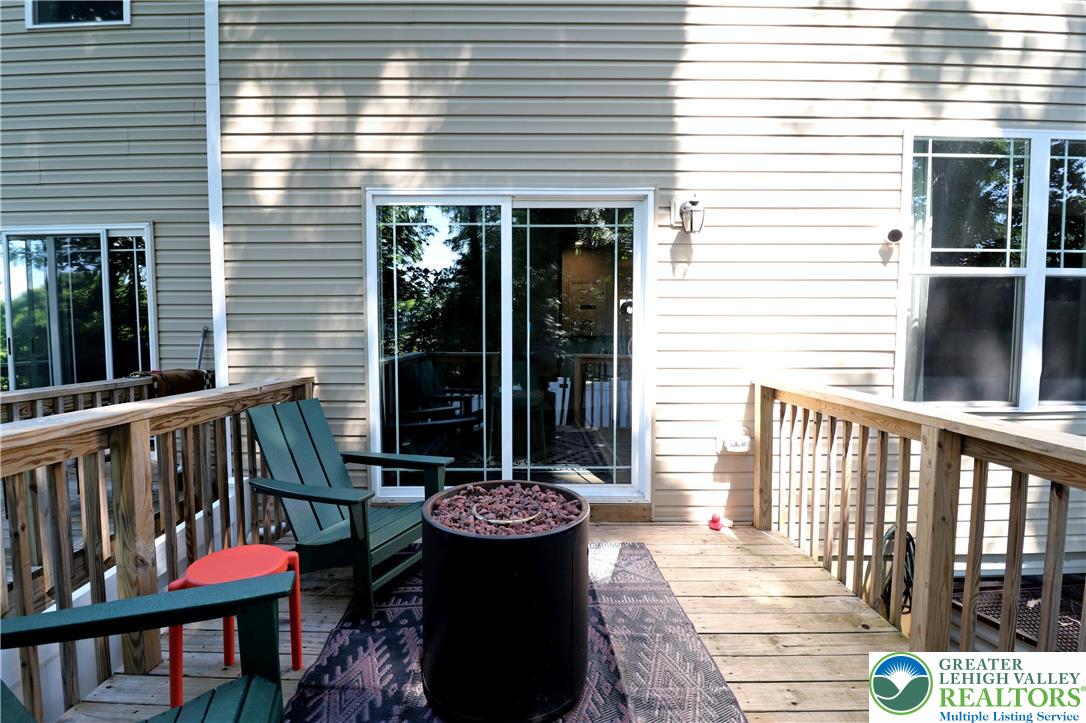 4502 Benjamin Court Emmaus, PA 18049 - Photo 20 of 53 A spacious wooden deck provides ample room for outdoor enjoyment and direct access to the interior.