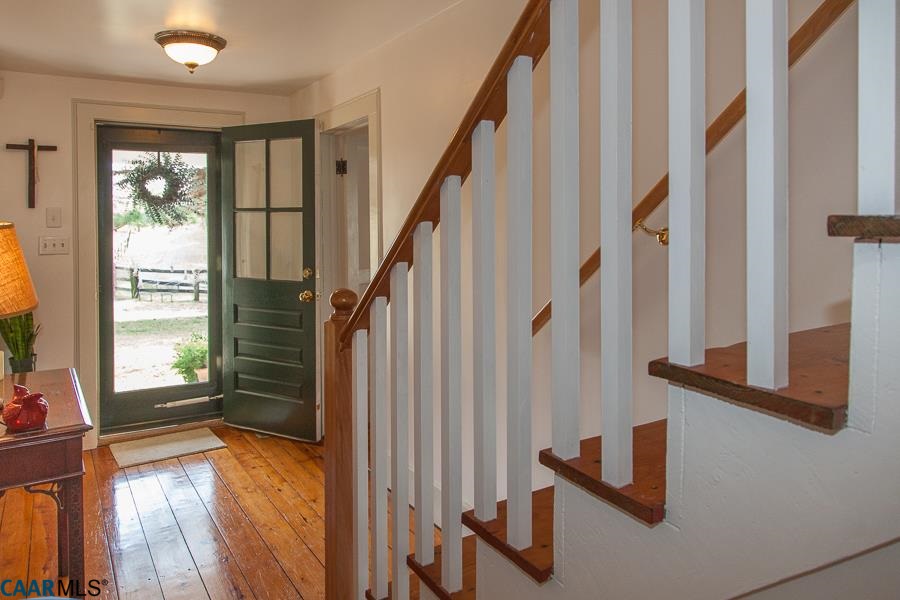 1015 Poplar Spring Road Scottsville, VA 24590 - Photo 14 of 34 a view of an entryway with wooden floor and windows