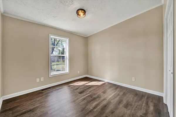 a view of a bathroom from a hallway