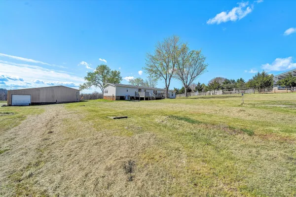 a house view with a garden space