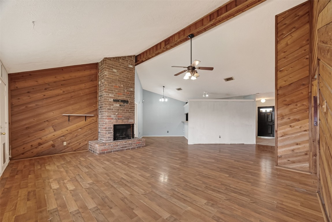 10135 Shell Rock Road La Porte, TX 77571 - Photo 3 of 17 a view of an empty room with a fireplace