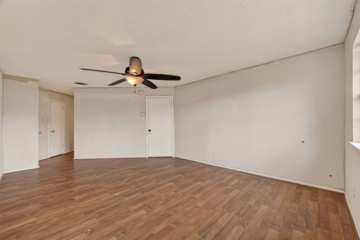 10135 Shell Rock Road La Porte, TX 77571 - Photo 8 of 17 a view of empty room with wooden floor