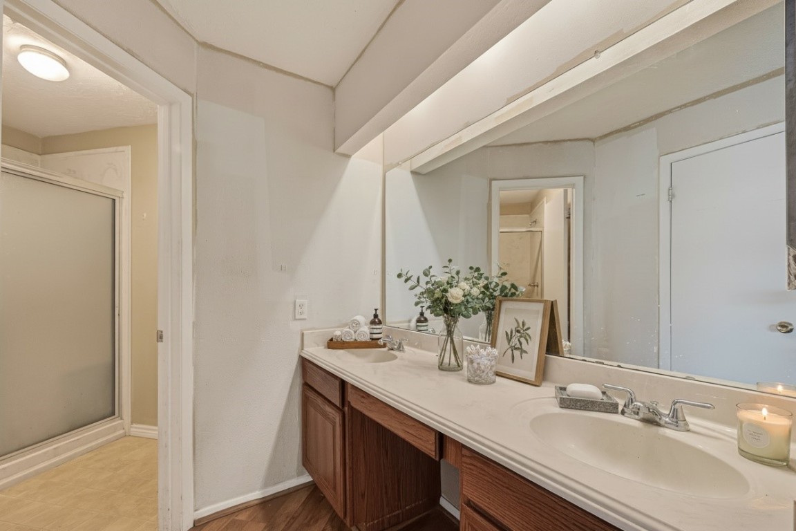 10135 Shell Rock Road La Porte, TX 77571 - Photo 10 of 17 a bathroom with a sink and a mirror