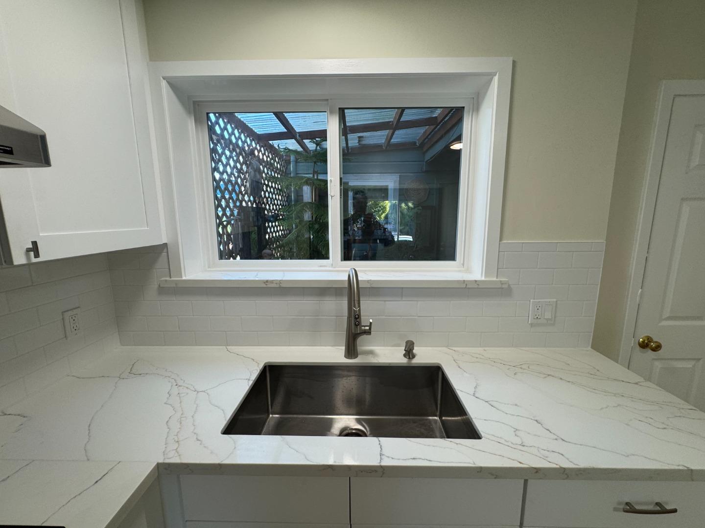 370 Bartlett Street, Unit 3 San Francisco, CA 94110 - Photo 21 of 35 a sink sitting next to a window