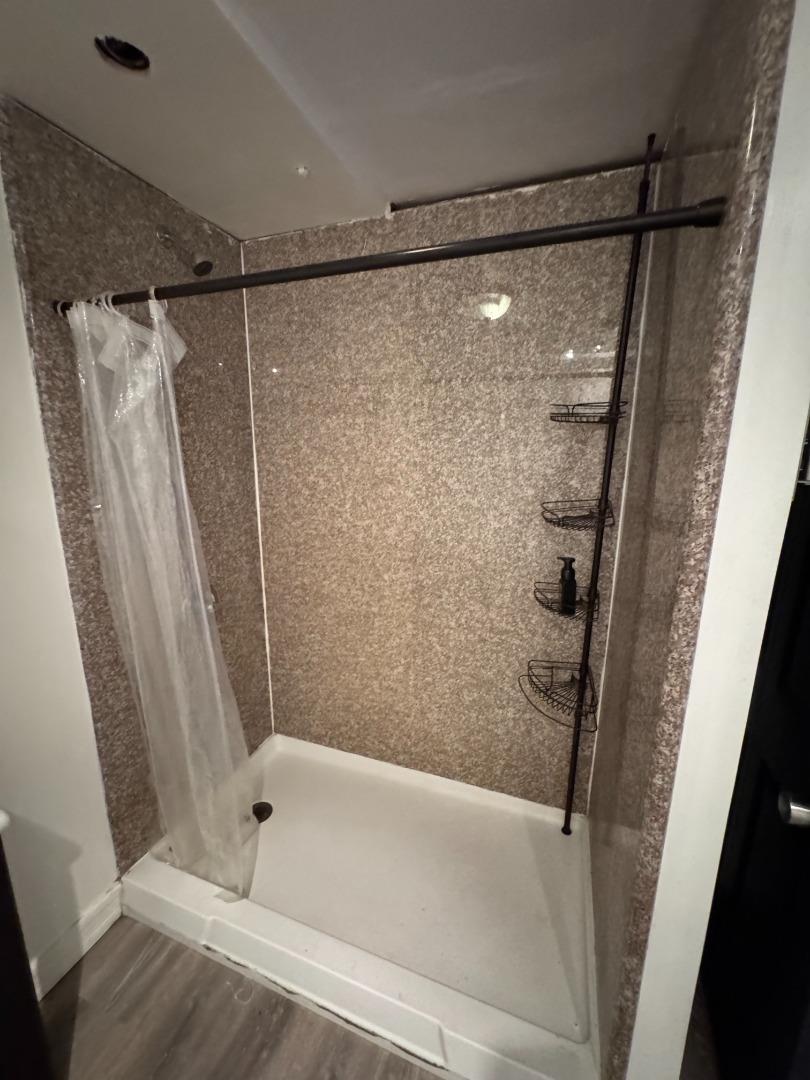 370 Bartlett Street, Unit 3 San Francisco, CA 94110 - Photo 26 of 35 a bathroom with a shower and a tub