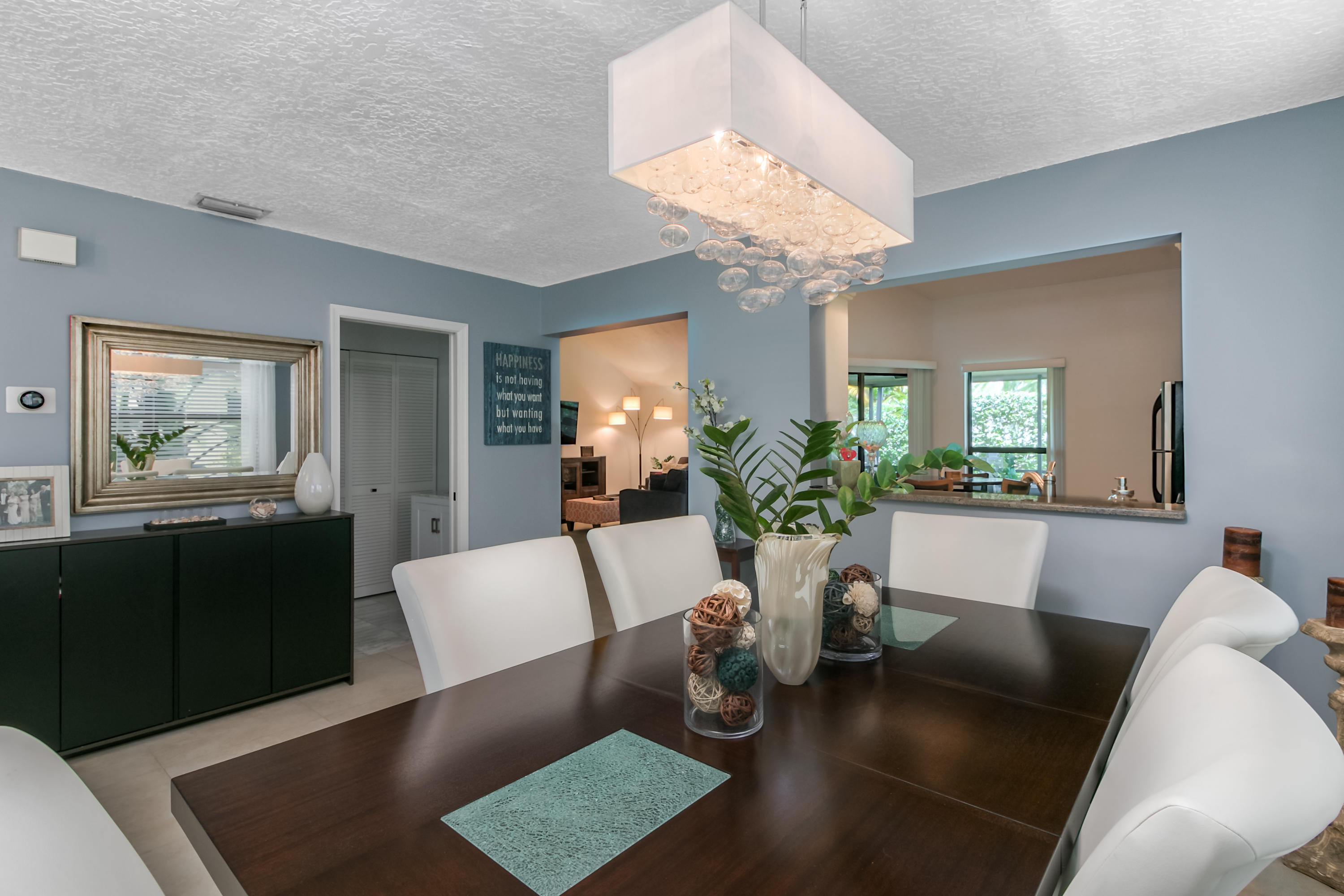 9311 Ketay Circle, Unit 4 Boca Raton, FL 33428 - Photo 6 of 24 Dining room with pass thru from kitchen