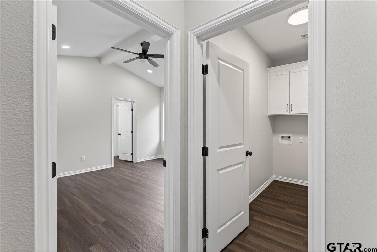 117 Bexar Mabank, TX 75147 - Photo 12 of 19 a view of a hallway with wooden floor and closet area