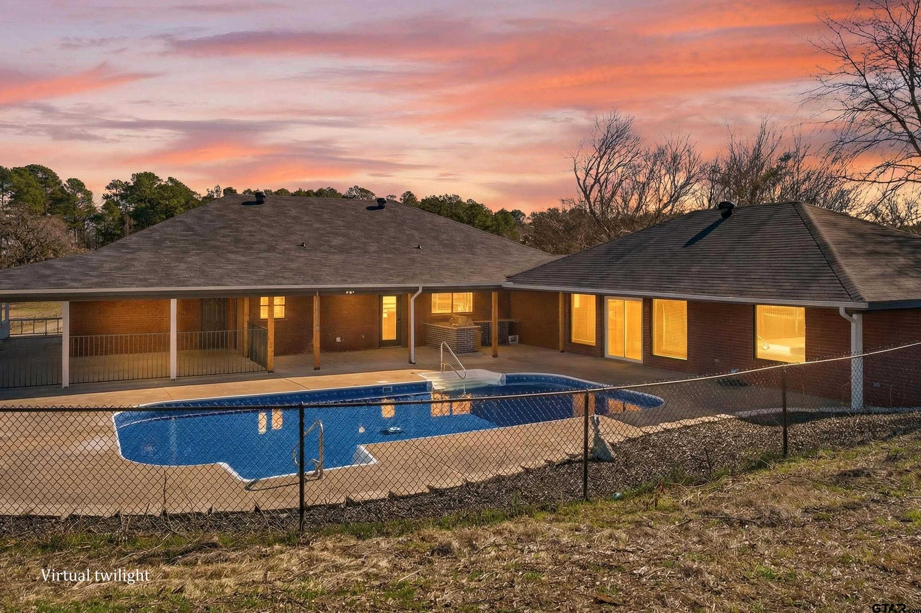 10418 East Fm 2011 Longview, TX 75603 - Photo 12 of 45 a view of wooden house with a yard
