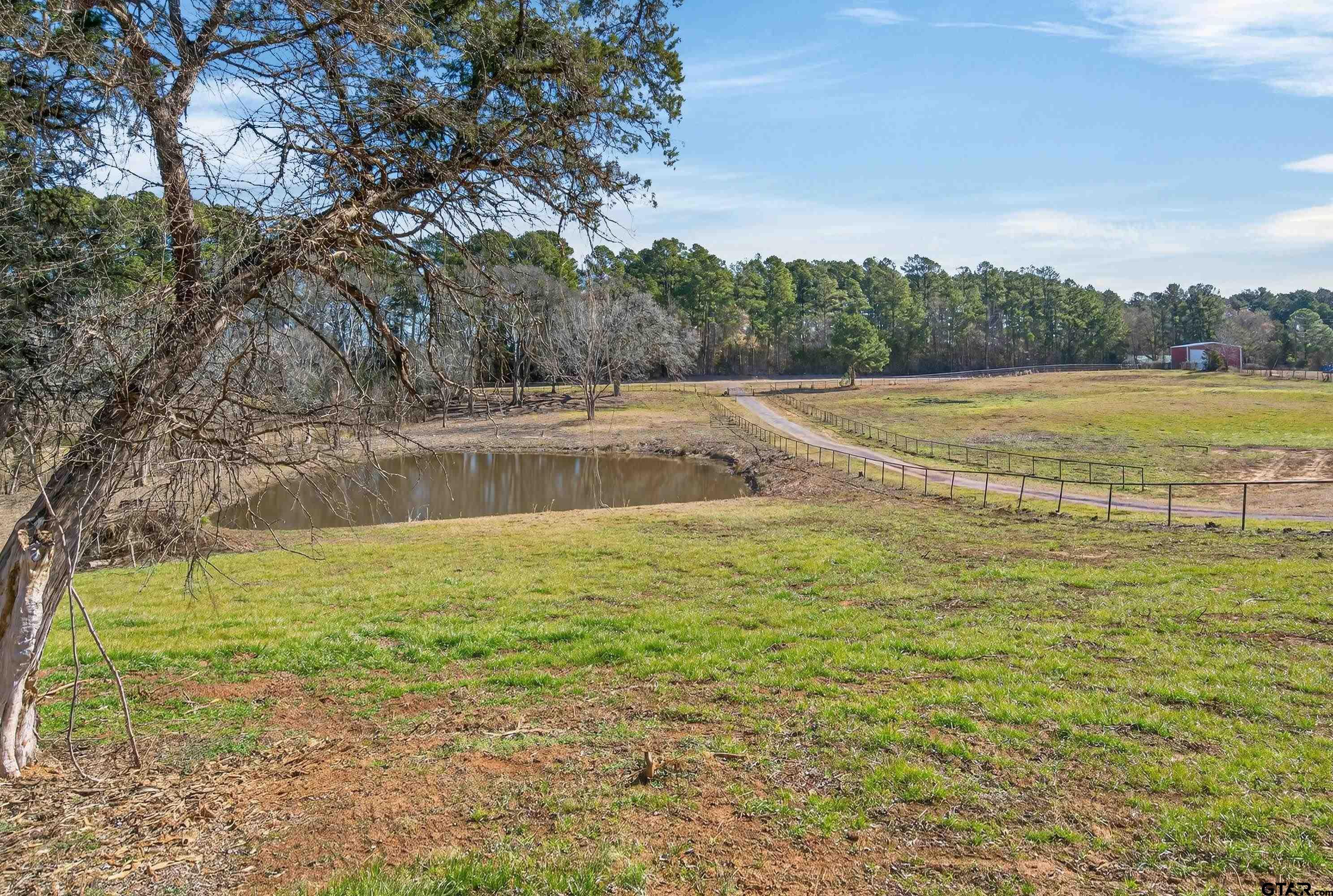 10418 East Fm 2011 Longview, TX 75603 - Photo 18 of 45 a view of a yard with an outdoor space