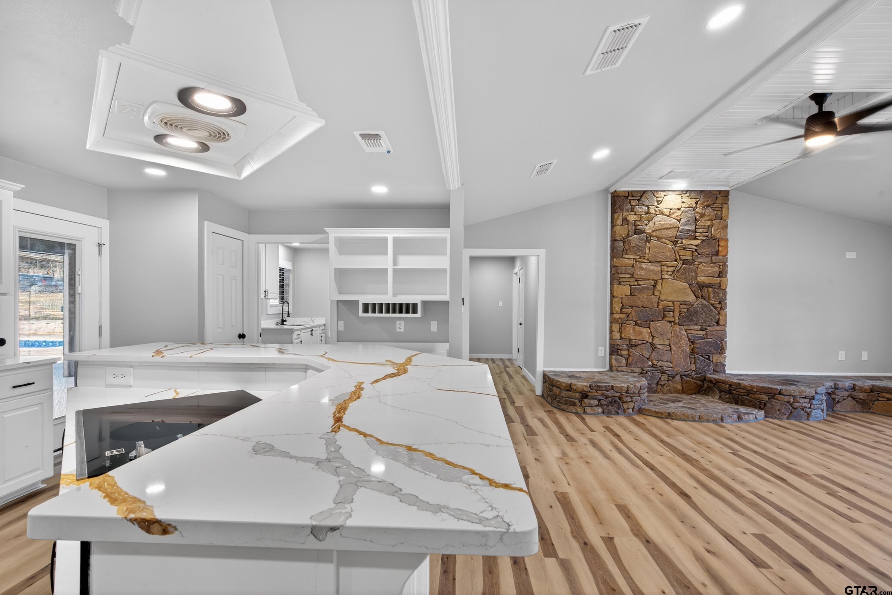 10418 East Fm 2011 Longview, TX 75603 - Photo 30 of 45 a large white kitchen with a large window