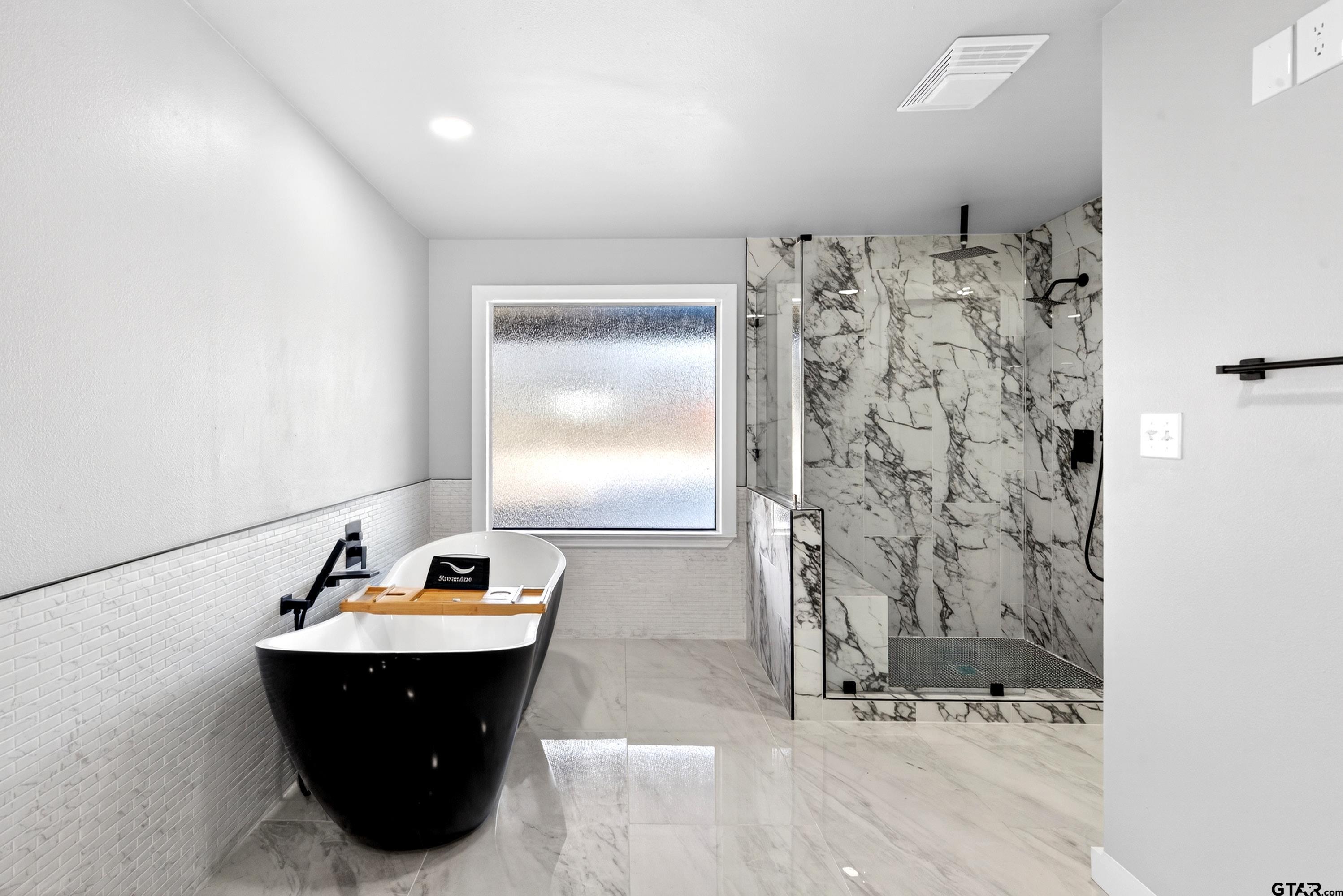 10418 East Fm 2011 Longview, TX 75603 - Photo 42 of 45 a room with a table and chairs