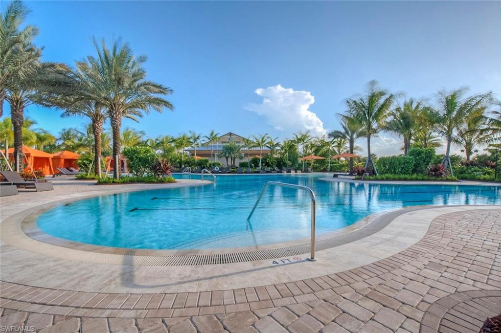 9365 Pocida Court, Unit 202 Naples, FL 34119 - Photo 33 of 40 a view of outdoor space yard and swimming pool