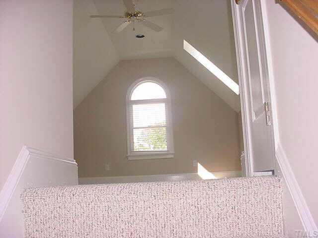 3437 Old Milburnie Road Raleigh, NC 27616 - Photo 10 of 10 a bedroom with a bed and a window