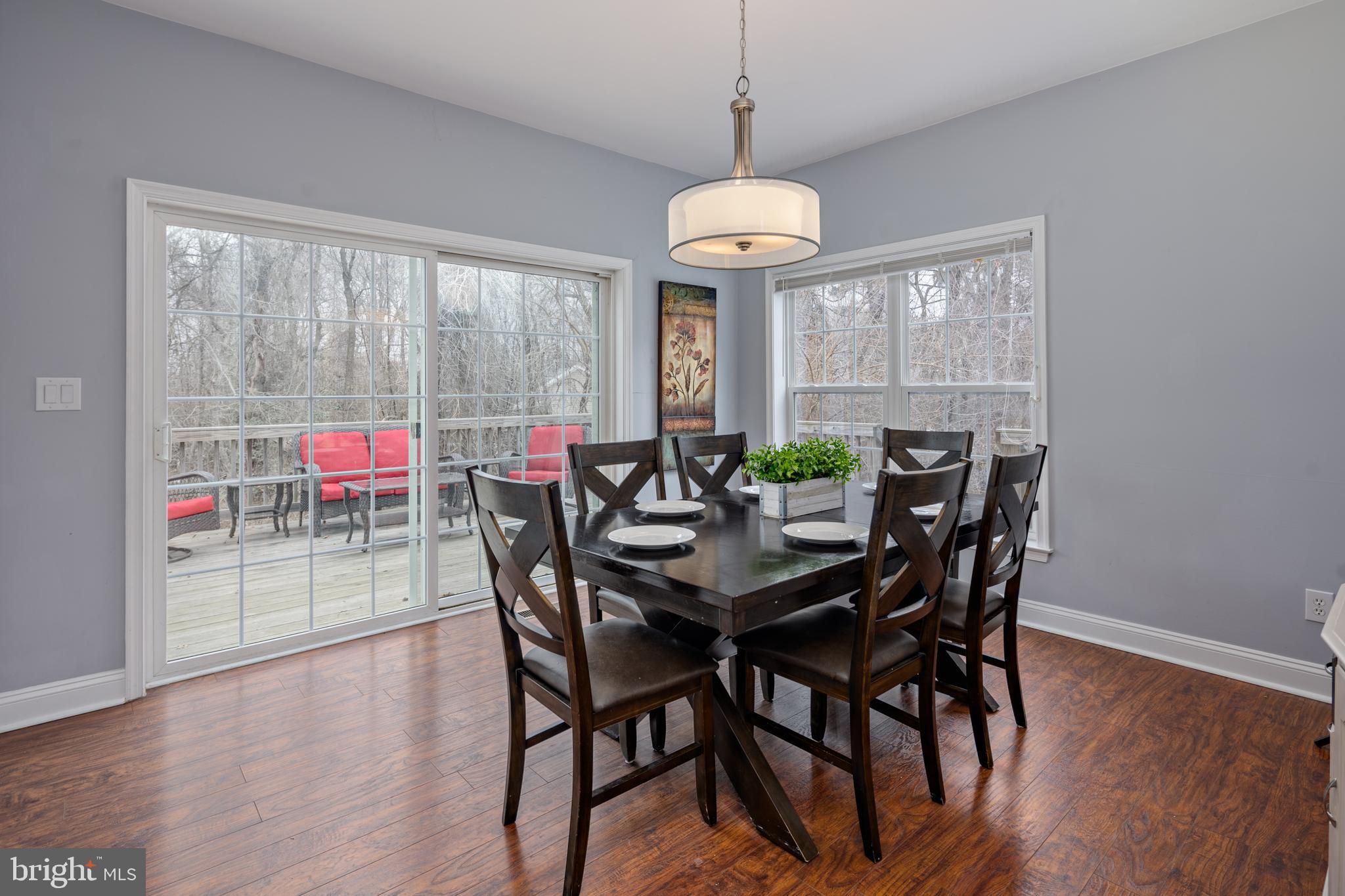 326 South Carolina Road Stevensville, MD 21666 - Photo 14 of 48 a view of a dining room with furniture wooden floor and chandelier