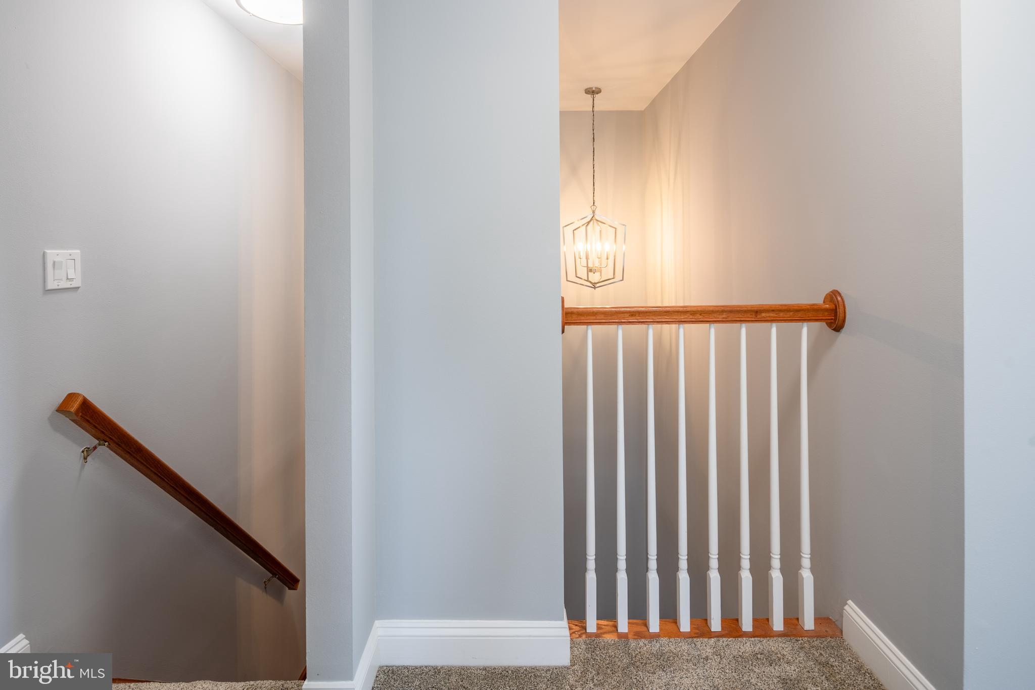 326 South Carolina Road Stevensville, MD 21666 - Photo 17 of 48 a view of a hallway with wooden floor