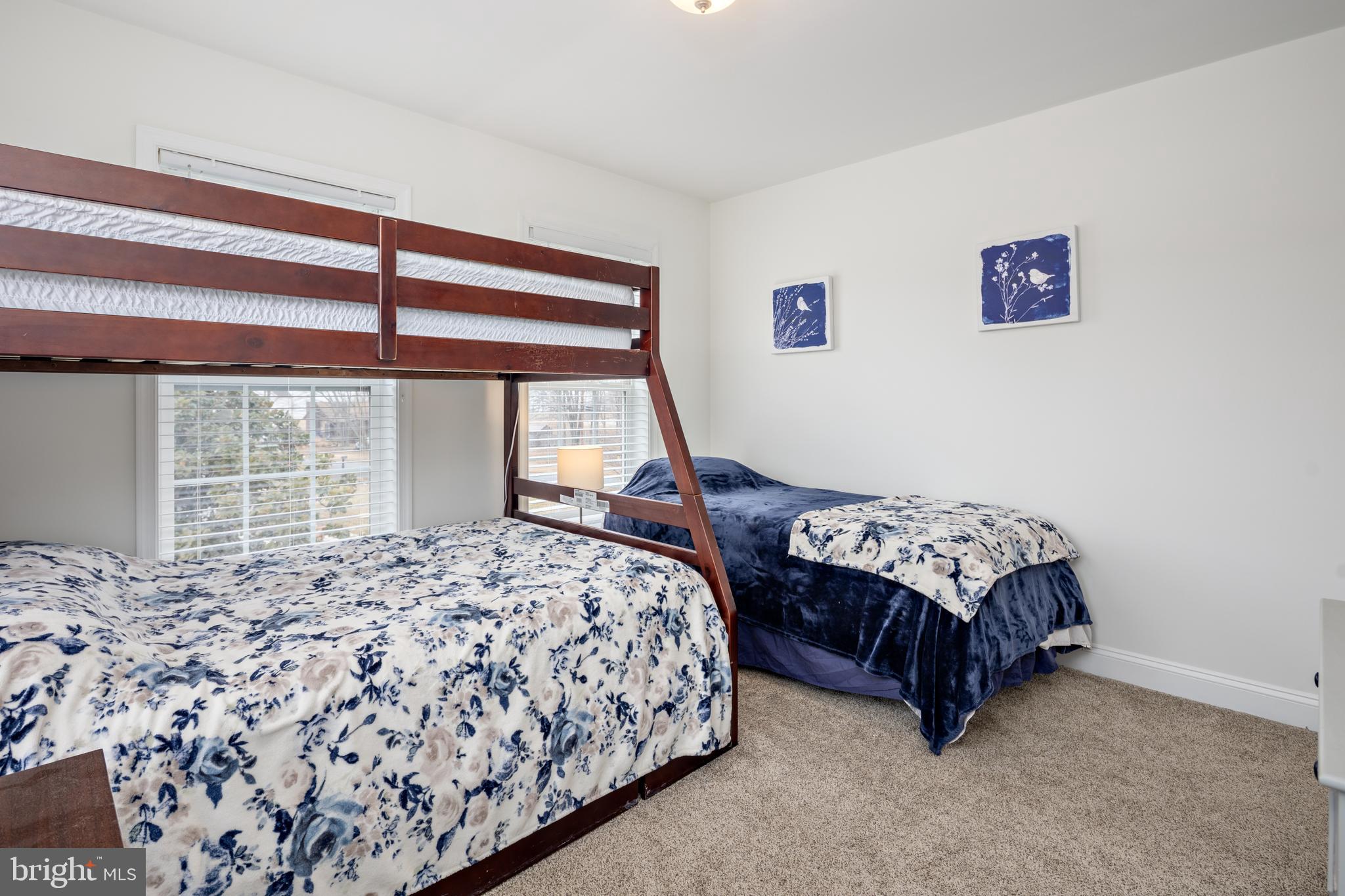 326 South Carolina Road Stevensville, MD 21666 - Photo 30 of 48 a bedroom with two beds and window