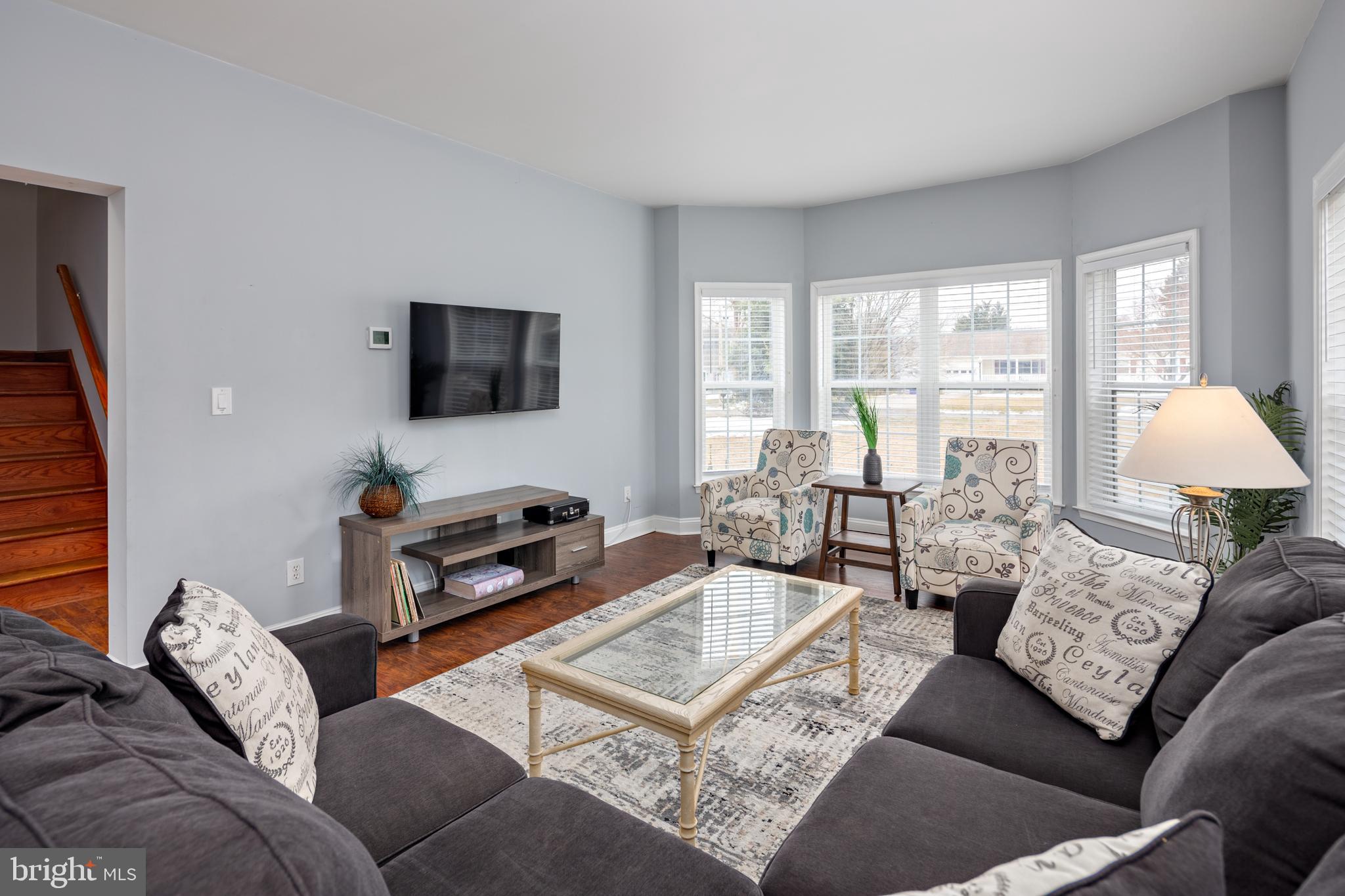 326 South Carolina Road Stevensville, MD 21666 - Photo 3 of 48 a living room with furniture and a flat screen tv